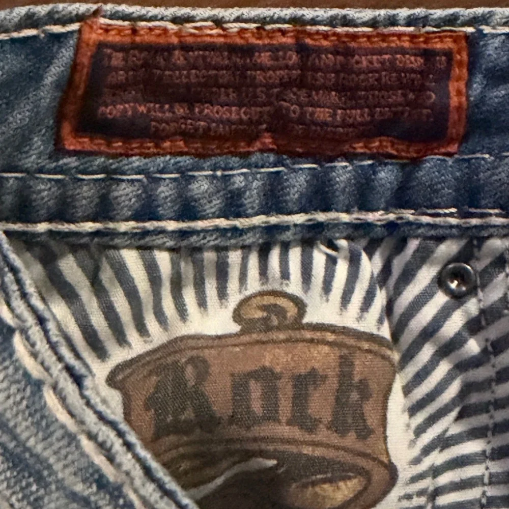 Rock Revival Y2K Low rise Kai Jean shorts sz 26 bling flap pockets frayed hem
